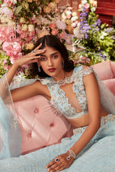 Ice blue chikankari lehenga with raw silk embroidered blouse and cape